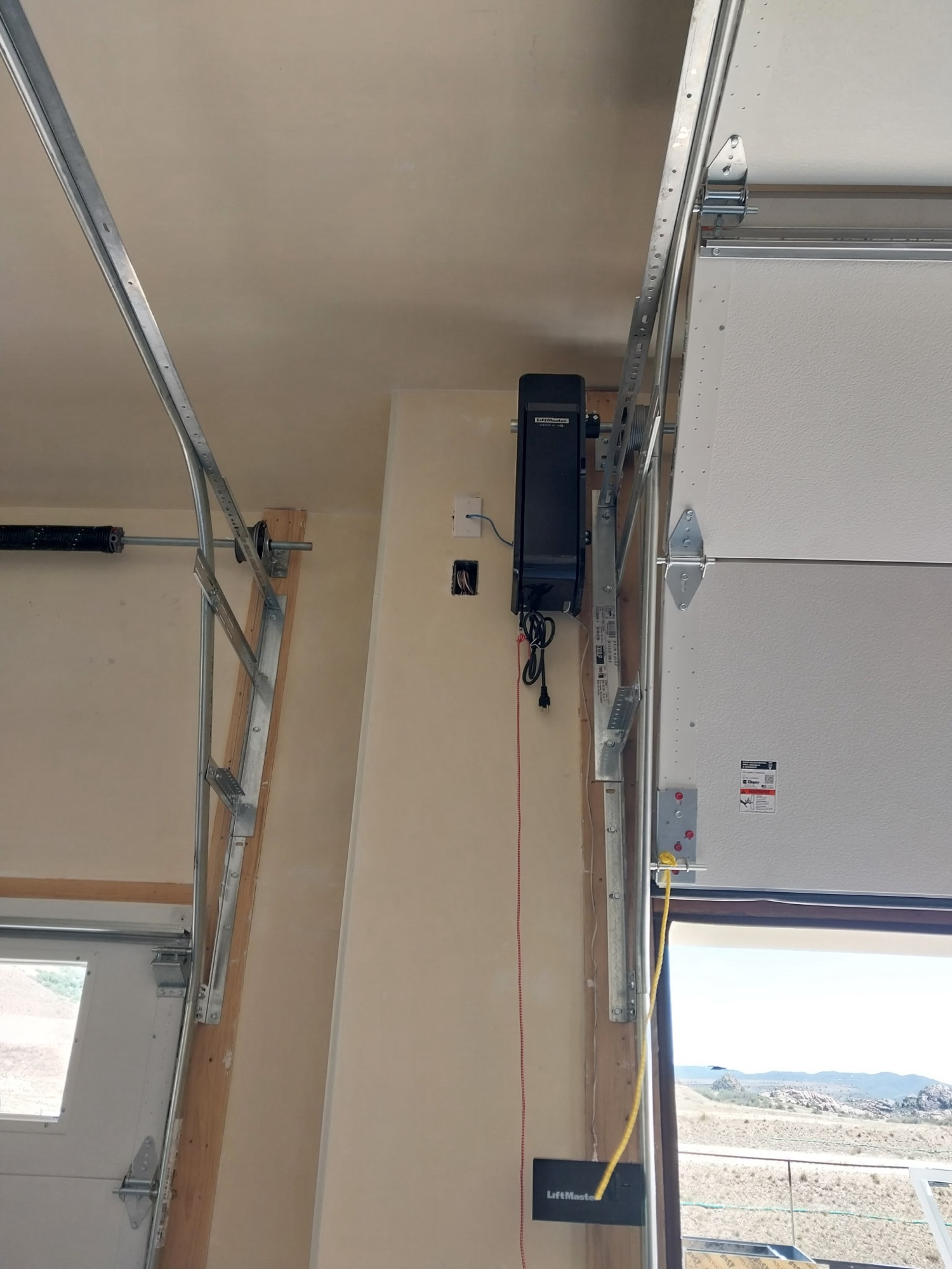 LiftMaster wall-mount opener installed on new garage door